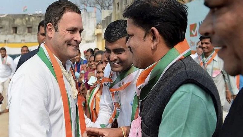 Congress vice-president Rahul Gandhi greets party workers at a rally in Pavi Jetpur, Chhota Udaipur Congress vice-president Rahul Gandhi greets party workers at a rally in Pavi Jetpur, Chhota Udaipur