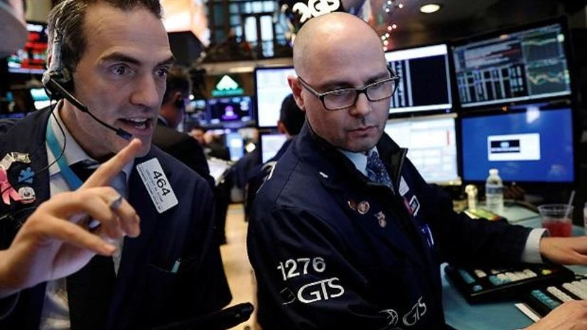 Traders on the floor of the New York Stock Exchange Traders on the floor of the New York Stock Exchange