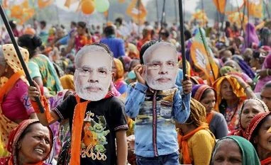 Gujarat Assembly election 2017: Full list of 93 seats in Phase-2 of polling Supporters wear mask of Prime Minister Narendra Modi during an election campaign rally in support of BJP candidates, in Gujarat