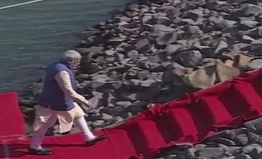 Gujarat polls: PM Modi lands at Sabarmati river's Dharoi dam via seaplane Gujarat polls: PM Modi lands at Sabarmati river's Dharoi dam via seaplane