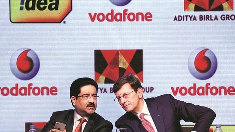Kumar Mangalam Birla (left), chairman of Aditya Birla Group, with Vittorio Colao, CEO of Vodafone Group. Photo: Reuters Kumar Mangalam Birla (left), chairman of Aditya Birla Group, with Vittorio Colao, CEO of Vodafone Group. Photo: Reuters