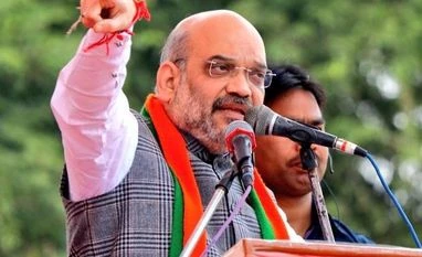 Why is Manmohan silent when PM of his country is called 'neech': Amit Shah Amit Shah. Photo courtesy: @AmitShah Twitter handle