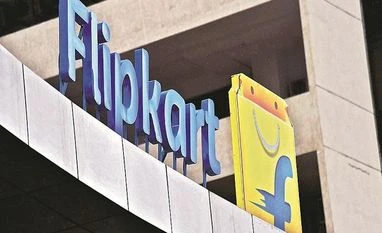 Walmart in advanced talks to buy minority stake in Flipkart: Report Flipkart arm posts 19% growth in revenue