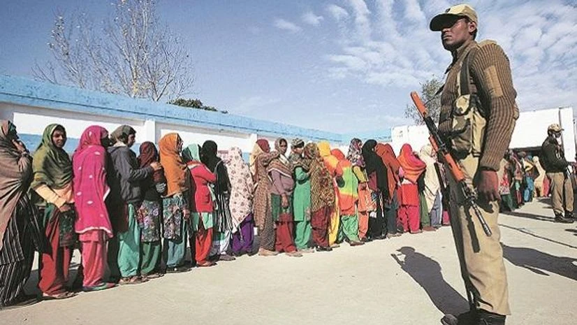 Voters line up to cast their votes. File photo: Reuters Voters line up to cast their votes. File photo: Reuters