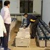 Election officers arrange the EVM machines inside the strong room on the day of state assembly election result, in Ahmedabad. Photo: PTI