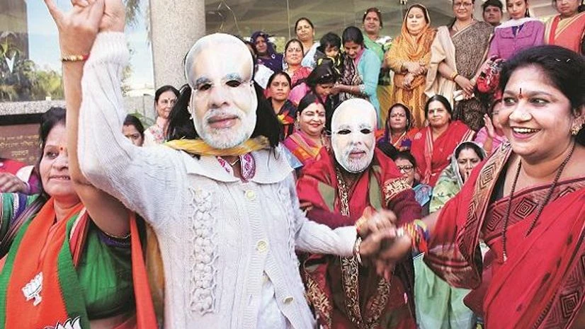 BJP’s Mahila Morcha workers celebrate the party’s success in Gujarat and Himachal Pradesh Assembly elections, in Bhopal on Monday. Photo: PTI BJP’s Mahila Morcha workers celebrate the party’s success in Gujarat and Himachal Pradesh Assembly elections, in Bhopal on Monday. Photo: PTI