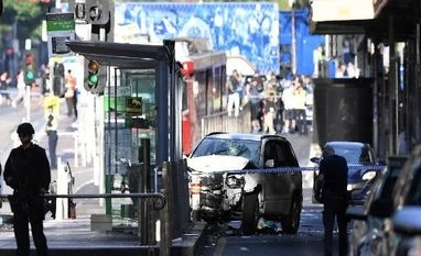 13 injured after car ploughs into pedestrians in Melbourne, two arrested Melbourne car attack