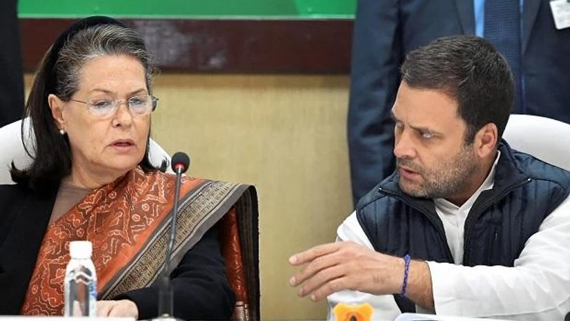 Rahul Gandhi, Sonia Gandhi, CWC Meeting Congress President Rahul Gandhi sits with his mother and former Congress president Sonia Gandhi at the Congress Working Committee (CWC) meeting in New Delhi on Friday. (Photo: PTI)