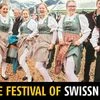 Men and women in traditional Swiss costumes at the Unspunnen festival.