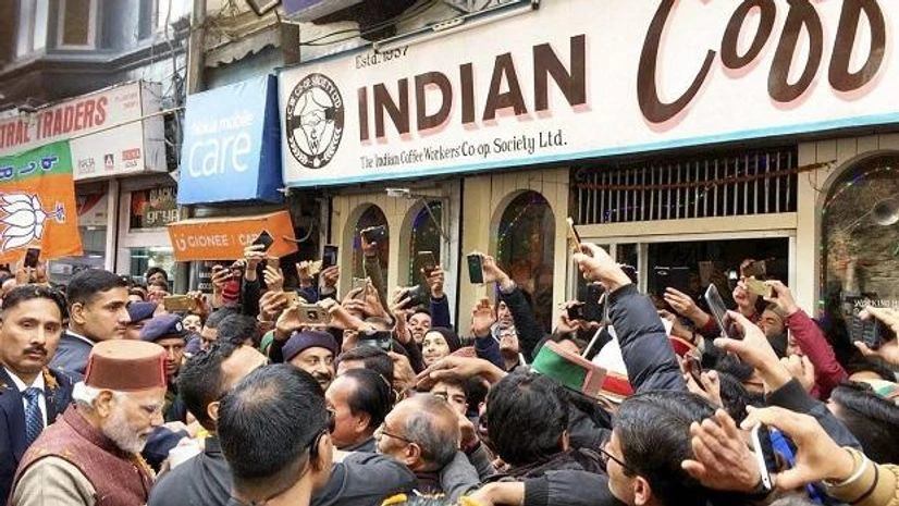 PM Narendra Modi relishes coffee at the Indian Coffee House on Mall road after the swearing-in ceremony in Shimla on Wednesday. Photo: PTI PM Narendra Modi relishes coffee at the Indian Coffee House on Mall road after the swearing-in ceremony in Shimla on Wednesday. Photo: PTI