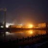 China factory growth slows slightly in Dec amid smog and debt curbs