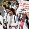 Medical students observe black day during a protest rally against NMC (National Medical Commission) in Bhubaneswar on Tuesday. Photo: PTI