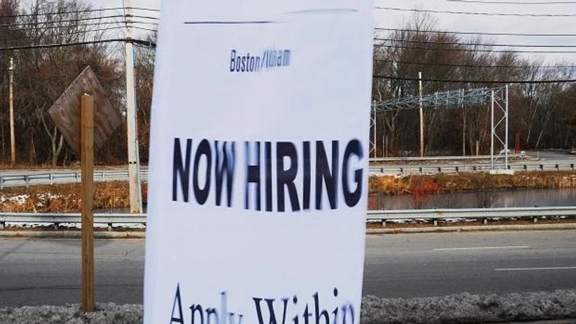 A sign advertises open jobs at an Embassy Suites hotel in Waltham, Massachusetts, US. Photo: Reuters A sign advertises open jobs at an Embassy Suites hotel in Waltham, Massachusetts, US. Photo: Reuters