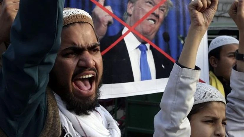 Donald Trump Pakistani religious students protest against U.S. President Donald Trump in Lahore. Photo: PTI