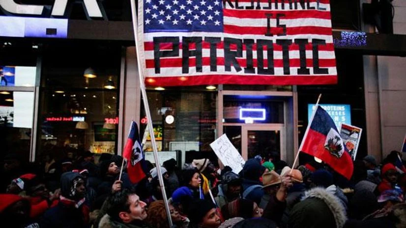 In pics: Haitian-Americans protest Donald Trump's 'racism' at Times Square In pics: Haitian-Americans protest Donald Trump's 'racism' at Times Square