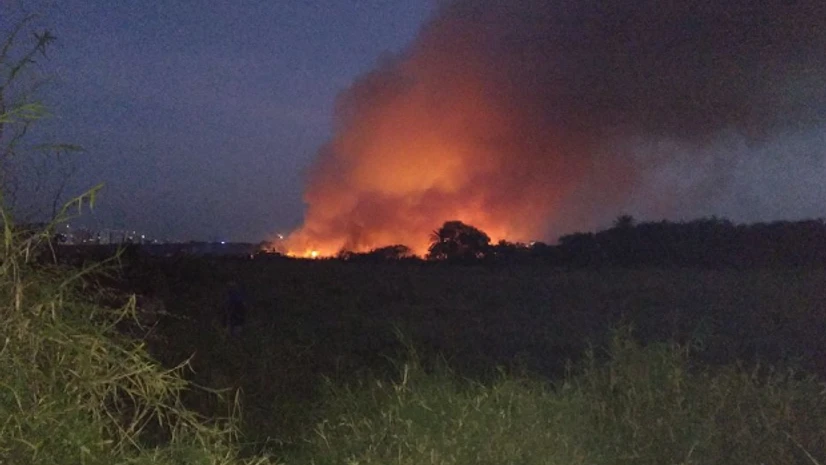 Fire breaks out again in Bengaluru's Bellandur Lake. The lake had caught fire earlier today which was later doused. Fire breaks out again in Bengaluru's Bellandur Lake. The lake had caught fire earlier today which was later doused.