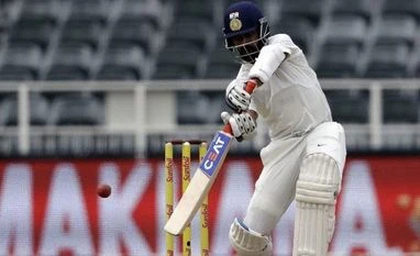 IND vs AUS: Focus on D/N Test, not thinking about captaincy, says Rahane India's batsman Ajinkya Rahane plays a shot on the third day of the third cricket test match between South Africa and India at the Wanderers Stadium in Johannesburg, South Africa. File photo: AP/PTI