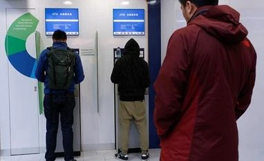 ATM withdrawals surge put Hong Kong monetary authorities on alert Hong Kong ATMs