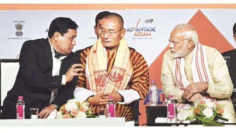 Sarbananda Sonowal, Dasho Tshering, Narendra Modi (From left) Assam Chief Minister Sarbananda Sonowal, Bhutanese Prime Minister Dasho Tshering Tobgay and Prime Minister Narendra Modi at the ‘Advantage Assam - Global Investors Summit in Guwahati. Photo: PTI