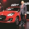 Maruti Suzuki Managing Director and CEO Kenichi Ayukawa (right) and senior executive director RS Kalsi showcase the all-new Swift