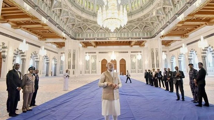 Narendra Modi Prime Minister Narendra Modi visits the Sultan Qaboos Grand Mosque in Muscat, Oman. (PTI Photo)