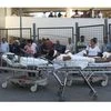 Patients rest in their hospital beds parked outside the General Hospital after they were evacuated, in Veracruz, Mexico. (Photo: AP/PTI)