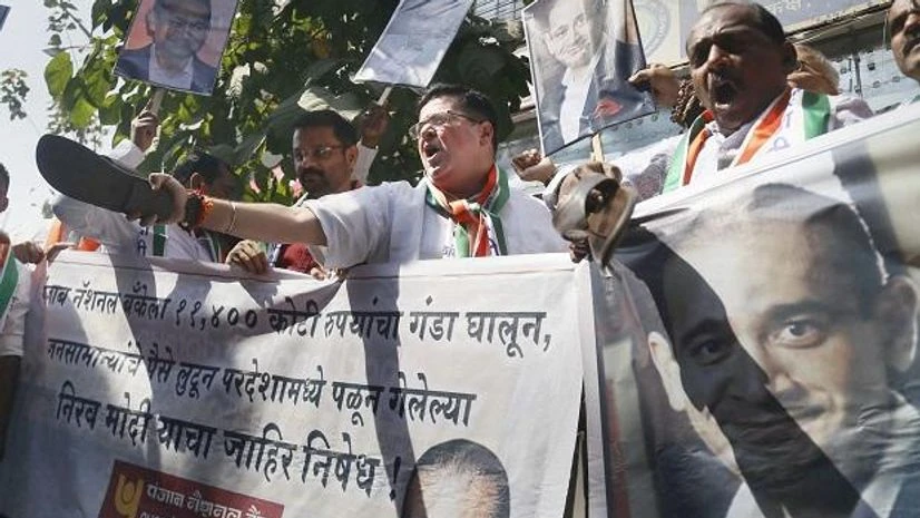 PNB fraud NCP activists raise slogans during a protest against Nirav Modi in the Punjab National Bank fraud case in Thane, Mumbai. (Photo: PTI)