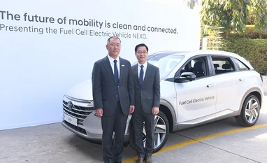 Hyundai's NEXO Electric SUV can travel 609 km on a single charge Mr. Chung Eui-sun, Vice Chairman, Hyundai Motor Company with Mr. S H Kim, Vice President, Namyang R&D Centre, Hyundai Motor Company showcasing Next-Generation Fuel Cell Electric
