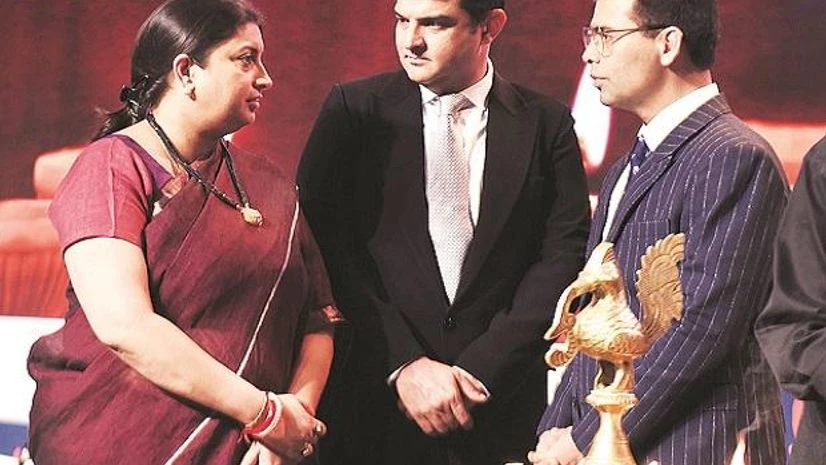 Smriti Irani, Union minister for information & broadcasting, Siddharth Roy Kapur, President, Producers Guild of India, and Karan Johar, director, at the inauguration of FICCI FRAMES 2018 in Mumbai on Sunday Photo: Kamlesh Pednekar Smriti Irani, Union minister for information & broadcasting, Siddharth Roy Kapur, President, Producers Guild of India, and Karan Johar, director, at the inauguration of FICCI FRAMES 2018 in Mumbai on Sunday Photo: Kamlesh Pednekar