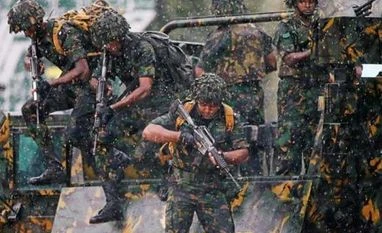 Sri Lanka troops raid terror 'safe house', kill two suspected IS gunmen Sri Lanka declares Emergency: Why hardliner Buddhists are targeting Muslims