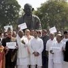 Congress President  Rahul Gandhi and Party leaders protest infront of Mahatma Gandhi Statue in Parliament during second phase of Budget Session in New Delhi. (Photo: PTI)