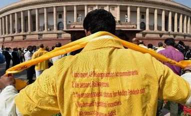 Still in alliance with BJP, but will fight for Andhra's rights: TDP TDP MP protest at Parliament House demanding special status for Andhra Pradesh during the second phase of the budget session in New Delhi