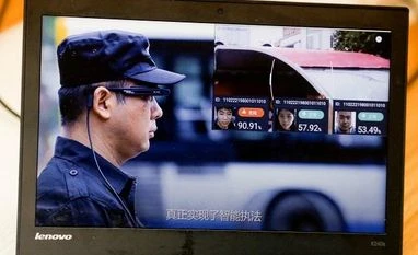 China eyes 'black tech' to boost security as parliament meets A promotion video for LLVision facial recognition smart glasses
