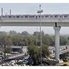 A Metro train moves across the new Majlis Park and Durgabai Deshmukh South Campus Metro section during a media preview in New Delhi, on Monday. Majlis Park-Shiv Vihar corridor (Line 7) of the metro network, also known as the Pink Line. (Photo: PTI)