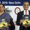 Defence Minister Nirmala Sitharaman and President FICCI, Rashesh Shah release a booklet during the 1st International Conference on Military Ammunition Make in India- Opportunities and Challenges" in New Delhi on Monday | Photo: PTI