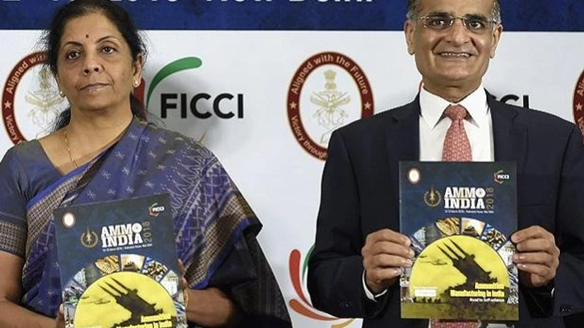 nirmala, sitharaman, nirmala sitharaman Defence Minister Nirmala Sitharaman and President FICCI, Rashesh Shah release a booklet during the 1st International Conference on Military Ammunition Make in India- Opportunities and Challenges" in New Delhi on Monday | Photo: PTI