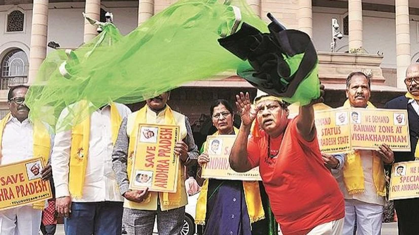 TDP MP Naramalli Sivaprasad and other party leaders stage a protest demanding special status for Andhra Pradesh outside Parliament in New Delhi on Friday. Photo: PTI TDP MP Naramalli Sivaprasad and other party leaders stage a protest demanding special status for Andhra Pradesh outside Parliament in New Delhi on Friday. Photo: PTI