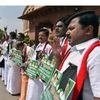 All India Anna Dravida Munnetra Kazhagam (AIADMK) leaders raise slogans demanding constitution for Cauvery Management Board during the budget session, at Parliament House in New Delhi. (Photo: PTI0