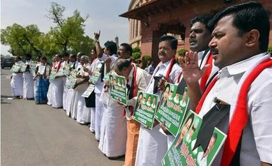 AIADMK protest outside parliament All India Anna Dravida Munnetra Kazhagam (AIADMK) leaders raise slogans demanding constitution for Cauvery Management Board during the budget session, at Parliament House in New Delhi. (Photo: PTI0