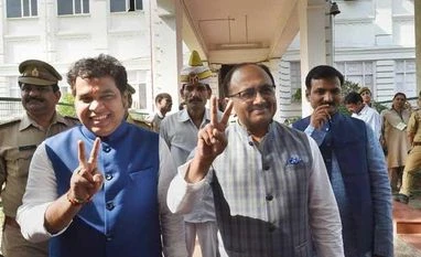 Rajya Sabha election result: 4 JDS rebels set to join Congress in Karnataka Leader of Opposition Ram Govind Chaudhary (centre) flashes a victory sign as he leaves the Tilak Hall after casting vote for Rajya Sabha in Lucknow