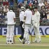 Cameron Bancroft of Australia, left, is questioned by umpires regarding ball tampering on the third day of the third cricket test between South Africa and Australia at Newlands Stadium | File Photo: AP
