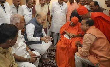 Amit Shah visits 110-year-old Lingayat seer Sri Shivakumara Swami Amit Shah