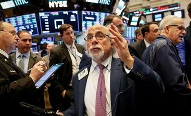 S&P 500 hits new high by gains in tech stocks after Fed keeps rates low Photo: Reuters