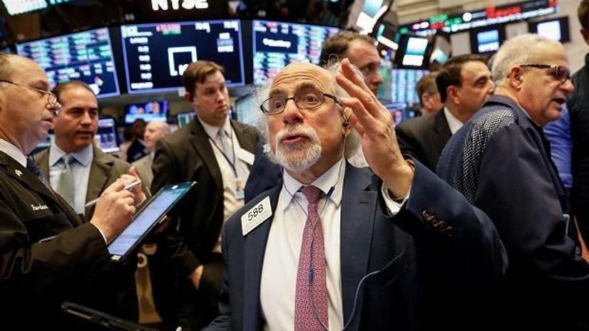 Wall Street, NYSE, Dow Jones, Nasdaq Traders work on the floor of the New York Stock Exchange. Photo: Reuters