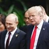 Indictment of Russian officers puts pressure on Trump at Putin summit