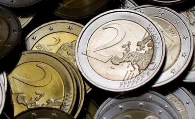 March euro zone factory PMI at 56.6; demand and optimism falls in the bloc UK PMI