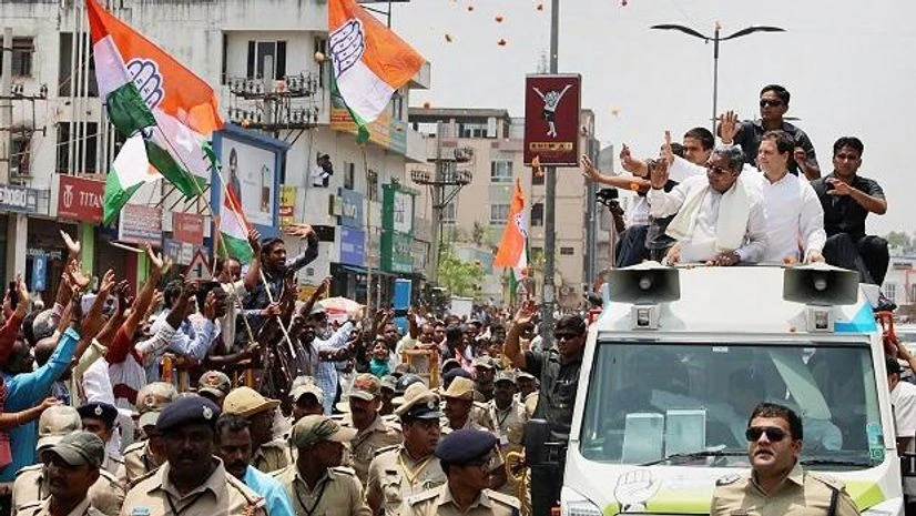 Rahul Gandhi Congress President Rahul Gandhi, with Karnataka Chief Minister Siddharamaiah and others, during Jan Sampark Yatra in Shimoga. Photo: PTI
