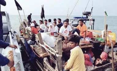 Malaysian coast guard intercepts boat carrying 56 Rohingya refugees Rohingya