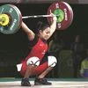 Indian weightlifter Punam Yadav competes in women’s 69kg category during the Commonwealth Games 2018 at Gold Coast in Australia on Sunday. 	Photo:PTI
