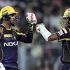 Kolkata Knight Riders batsman Sunil Narine celebrates his half century with teammate Robin Uthappa during an IPL cricket match 2018 against Royal Challengers Bangalore in Eden Gardens in Kolkata on Sunday. Photo: PTI